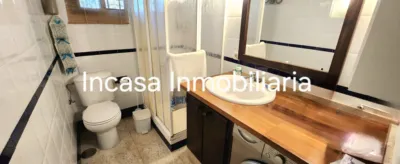Chalet for sale in Los Pinos de Valverde del Camino, in a beautiful area surrounded by nature. The property features a spacious living room with a fireplace, three double bedrooms, a bathroom with a shower tray, a kitchen with access to the barbecue area, a front terrace, a swimming pool, and a large plot with olive trees, fruit trees, a chicken coop, and a spacious garage. photo 11