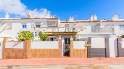 Chalet adosado en venta en Paseo de las Acacias, número s/n, Guadalmar (Distrito Churriana. Málaga Capital) de 550.000 €