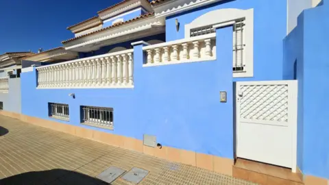 Casa adosada en calle Mandril, 13