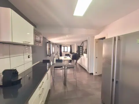 Casa adosada en calle de la Montaña de Humiaga