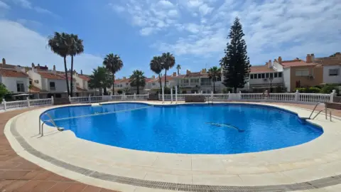 Casa adosada en calle de las Acacias de Guadalmar