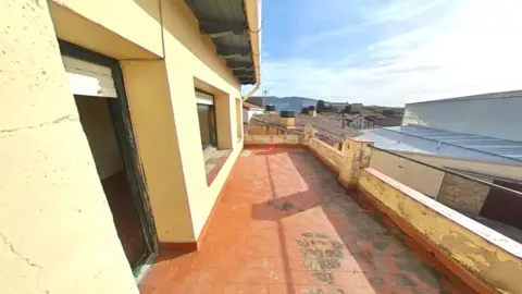 Casa adosada en calle de la Plaza