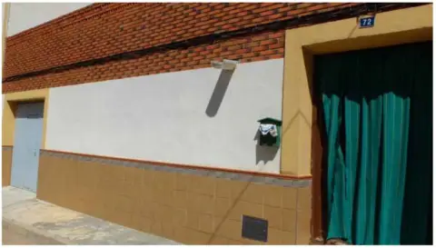 Casa adosada en calle de los Reyes Católicos