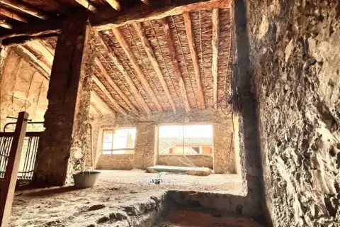 Casa adosada en calle de la Santísima Trinidad