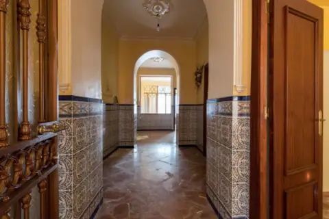 Casa adosada en calle de Muñoz y Pavón