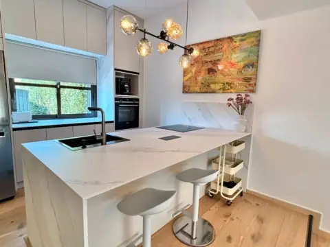 Casa adosada en calle de Escocia, 28