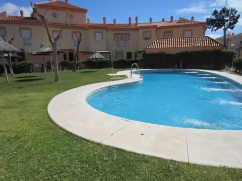 Casa adosada en Islantilla - Campo de Golf