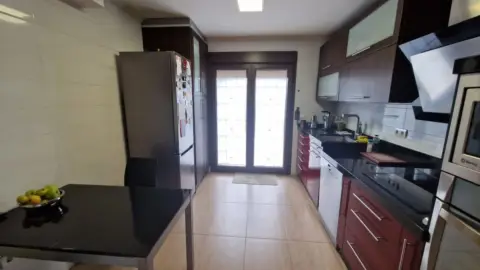 Casa adosada en calle del Barrio