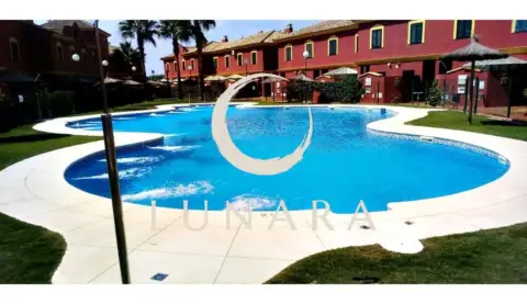 Casa adosada en Islantilla - Campo de Golf