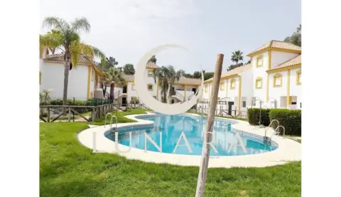 Casa adosada en Islantilla - Campo de Golf