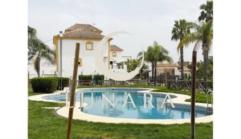 Casa adosada en Islantilla - Campo de Golf