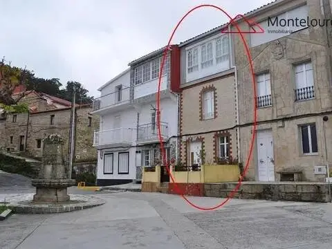 Casa adosada en Muros