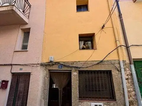 Casa adosada en calle de la Costanera