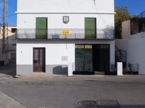 Casa adosada en calle de la Carretera