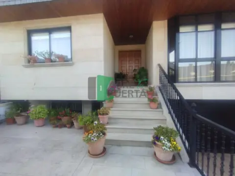 Casa adosada en calle de Xoán de Novoa