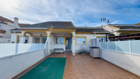 Casa adosada en calle