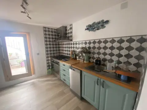 Casa adosada en calle de la Iglesia, 7