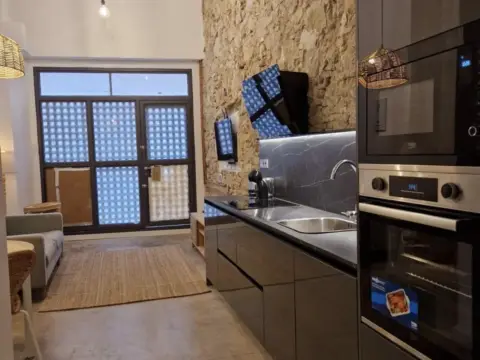 Estudio en Rambla del Raval, 1