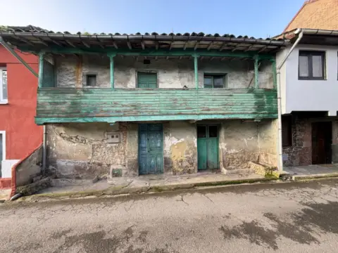 Casa adosada en calle Bisueña, nº 56