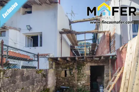 Casa adosada en Barrio del Marrón, 59