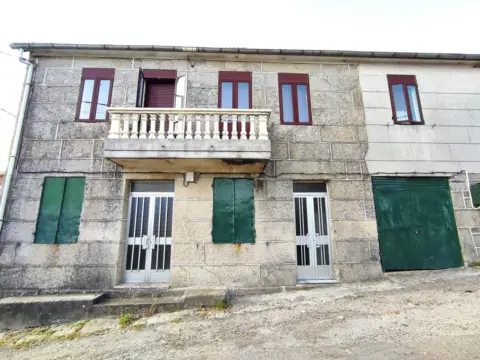 Casa en calle de Paredes