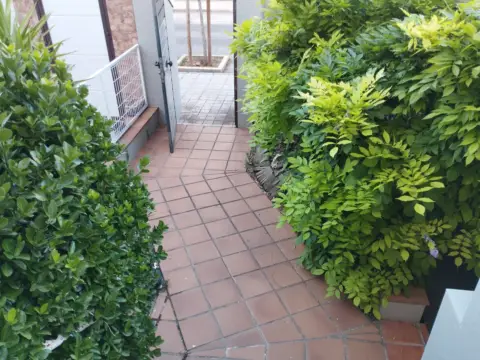 Casa adosada en calle de Arandano