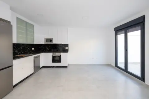 Casa pareada en calle de Agustín Lara
