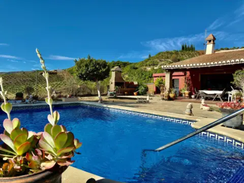 Chalet rústico en Benamocarra