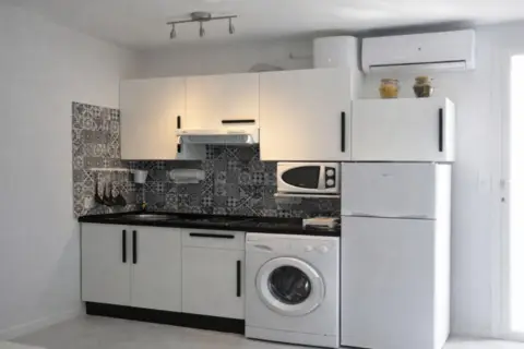 Estudio en calle de las Naciones, 1