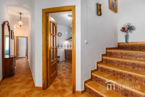 Chalet adosado en calle Comino, 1