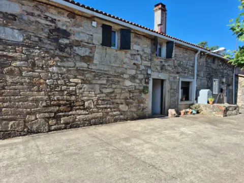 Casa adosada en calle Portecelo, nº 8