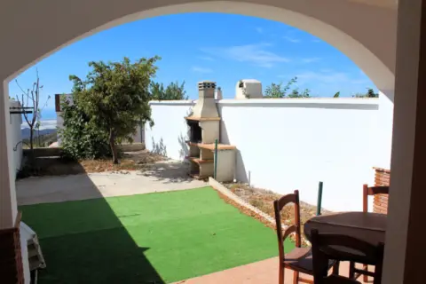 Casa adosada en calle El Olivo, nº 18